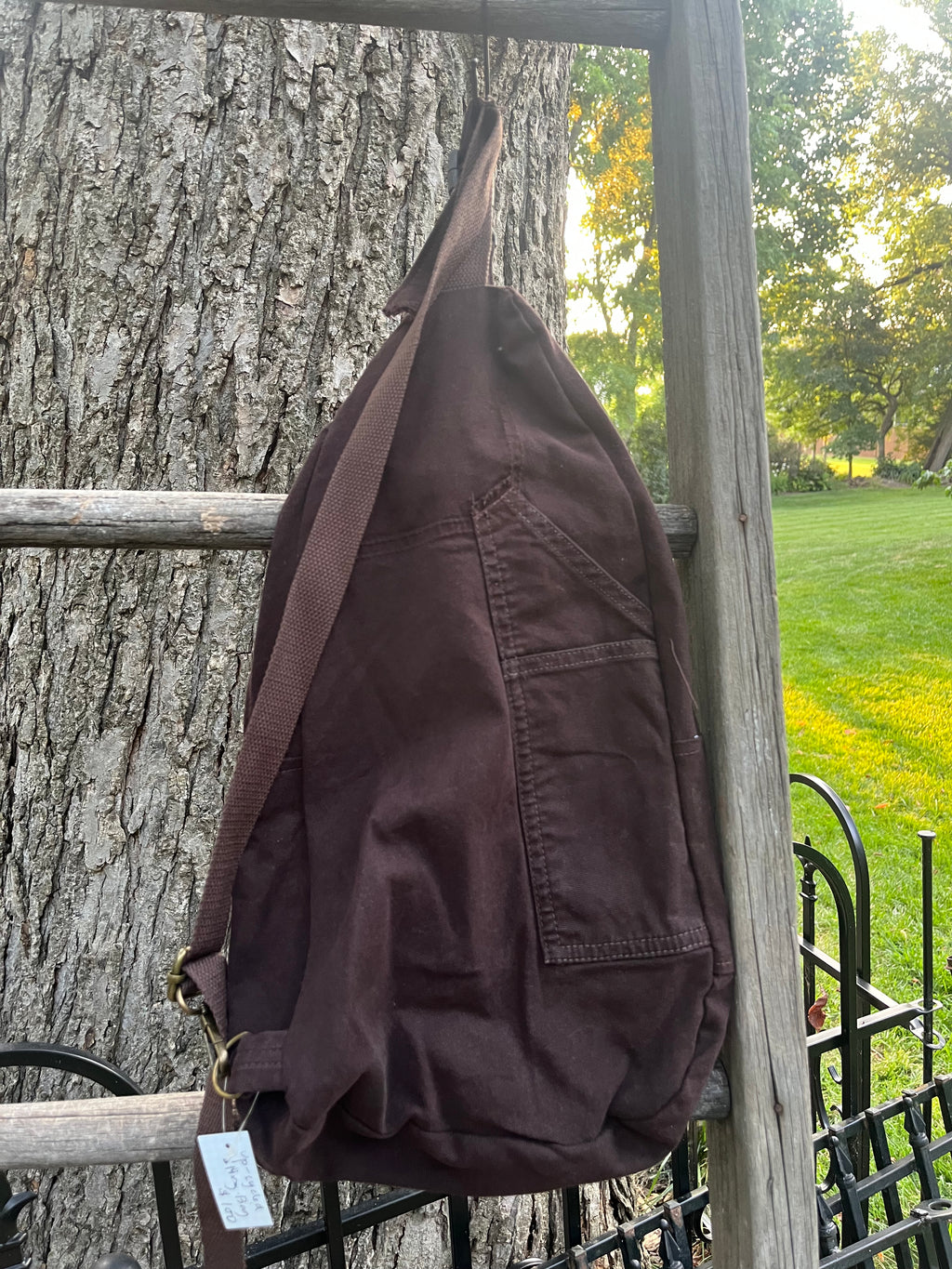 Up-cycled workwear sling bag.
